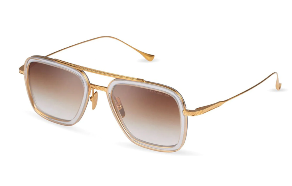 A close up shot of DITA FLIGHT.006 7806 sunglasses in Clear Crystal - Yellow Gold (7806-L-CLR-GLD-52).
