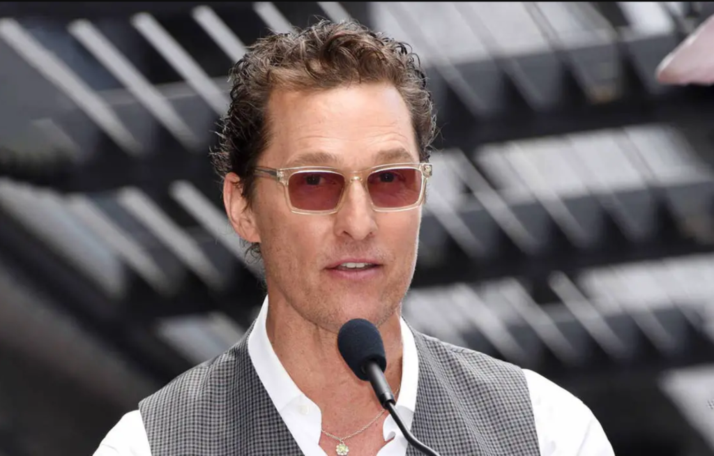 Matthew McConaughey wearing DITA Alican DTS-404 sunglasses during a Hollywood Walk of Fame ceremony honoring Guy Fieri.