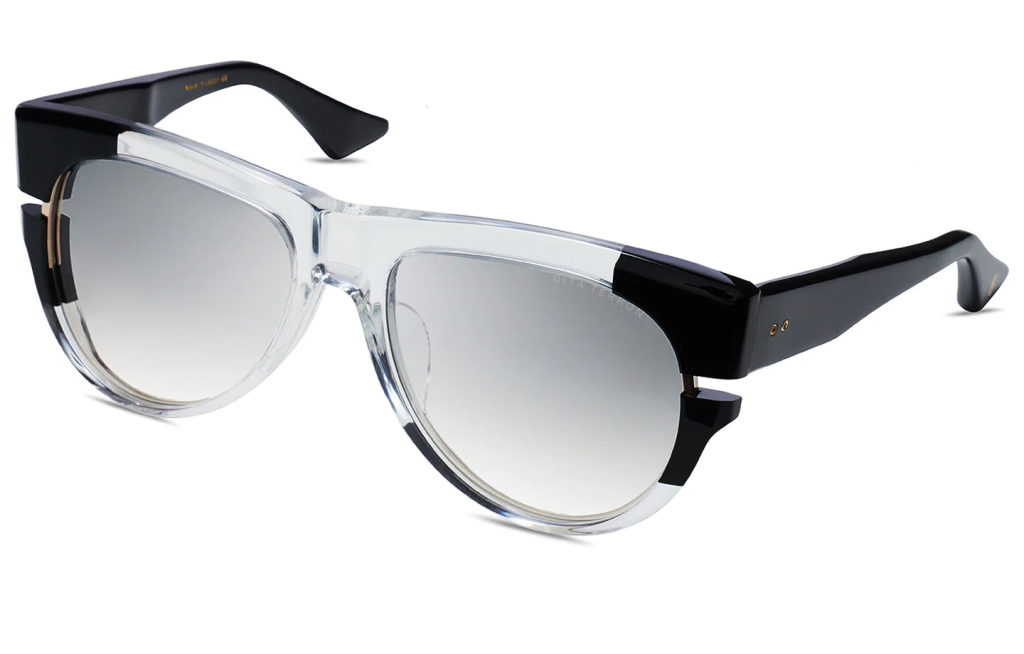 A close up shot of DITA TERRON DTS703-A sunglasses in Crystal - White Gold (lens is Light Grey to Light Brown Gradient) DTS703-A-03-Z.