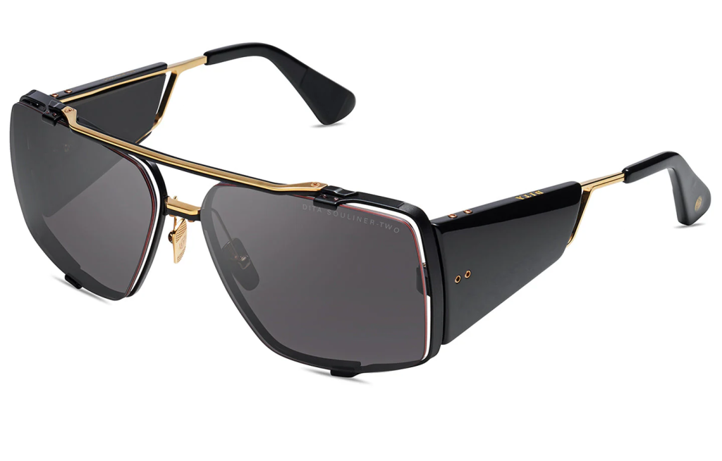 A close up shot of DITA SOULINER-TWO DTS136-64 sunglasses in Gold/Black Iron (lens is Dark Grey to Clear) DTS136-64-01-Z.