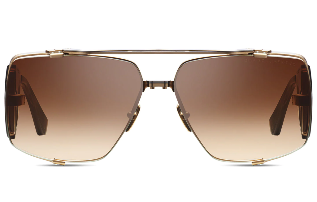 A close up shot of DITA SOULINER-TWO DTS136-64 sunglasses in White Gold/Black Palladium (lens is Dark Brown to Clear) DTS136-64-02-Z.