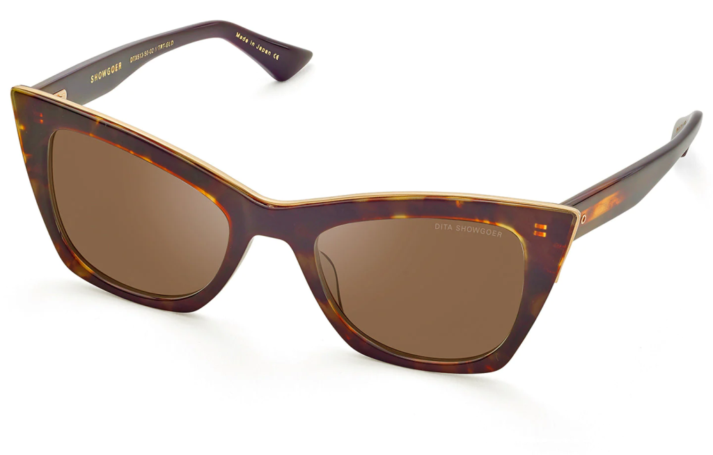 A close up shot of DITA SHOWGOER DTS513-50 sunglasses in Dark Tortoise-Burnt Brown Back - White Gold (lens is Brown) DTS513-50-02-Z.