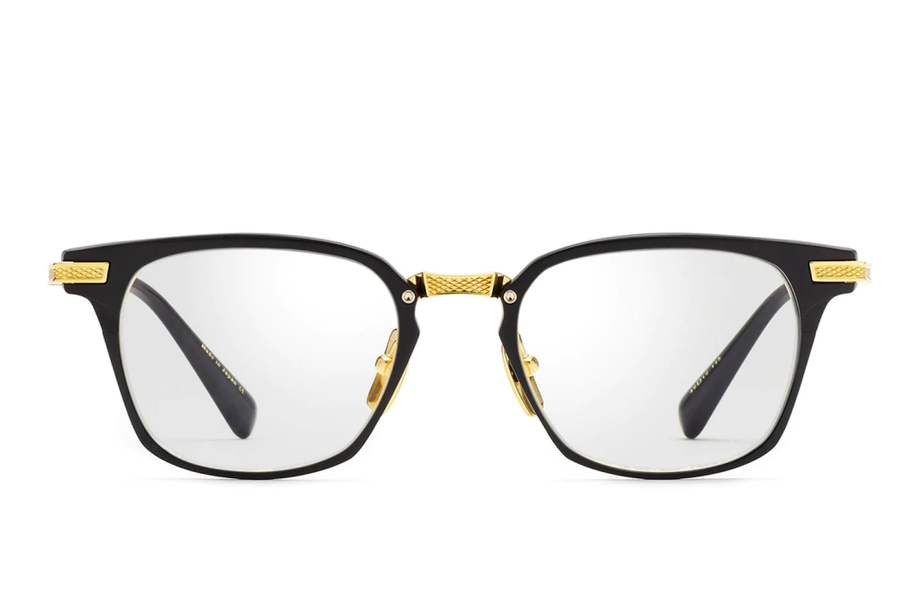 A close up shot of DITA UNION OPTICAL DRX-2068 sunglasses in Matte Black-12K Gold (lens is Clear) DRX-2068-A-BLK-GLD-52-Z. 