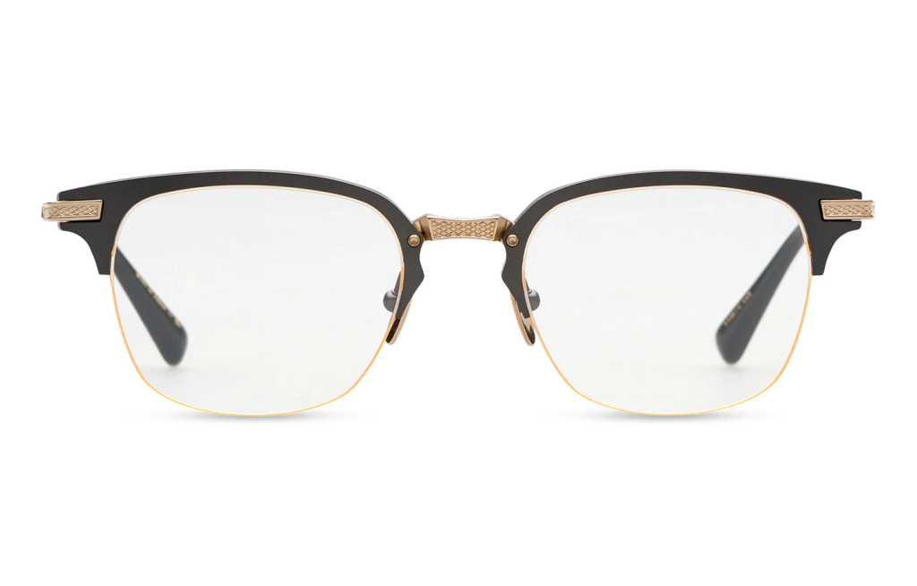 A close up shot of DITA UNION-TWO Optical DTX424-A sunglasses in Black Iron - White Gold (lens is Clear) DTX424-A-01.