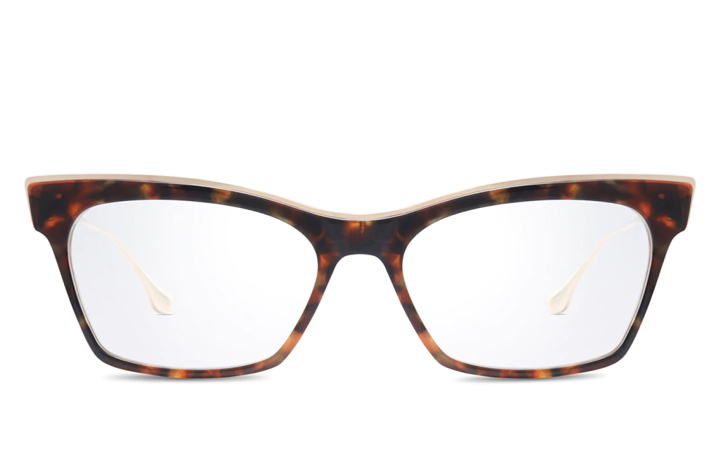 A close up shot of DITA NEMORA DTX401-A sunglasses in Haute Tortoise - White Gold (lens is Clear) DTX401-A-02-Z.