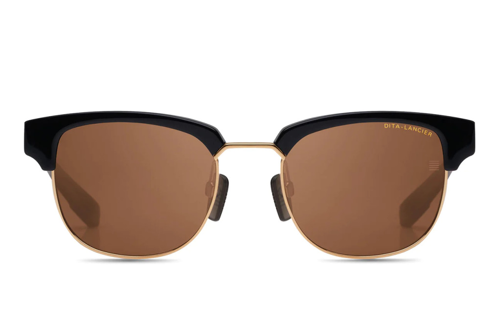 A close up shot of DITA LANCIER LSA-411 sunglasses in White Gold/Black (Land Lens - Brown Polarized) DLS411-A-01-A. 