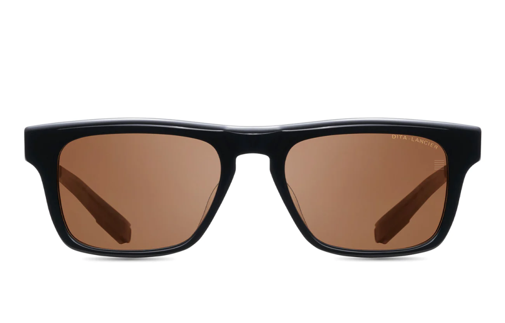 A close up shot of DITA LANCIER LSA-700 sunglasses in Black/White Gold (Land Lens - Brown Polarized) DLS700-53-02-A. 