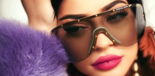 Kylie Jenner wearing Porsche Design Large Wraparound Frame sunglasses
