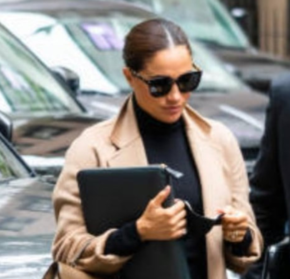 Meghan Markle rocking Valentino - Rockstud sunglasses.